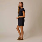 Cosmo Dress in Black shown on model on plain background.