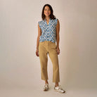 Reagan Top in Folk Floral shown on model on plain background.