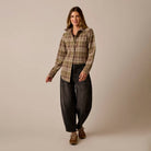 Female model shown wearing the Carve Fairbanks Supersoft Shirt in Dark Olive Plaid on plain background.
