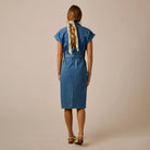 Carve Franny Lightweight Denim Dress in Magnolia shown on model on plain background.