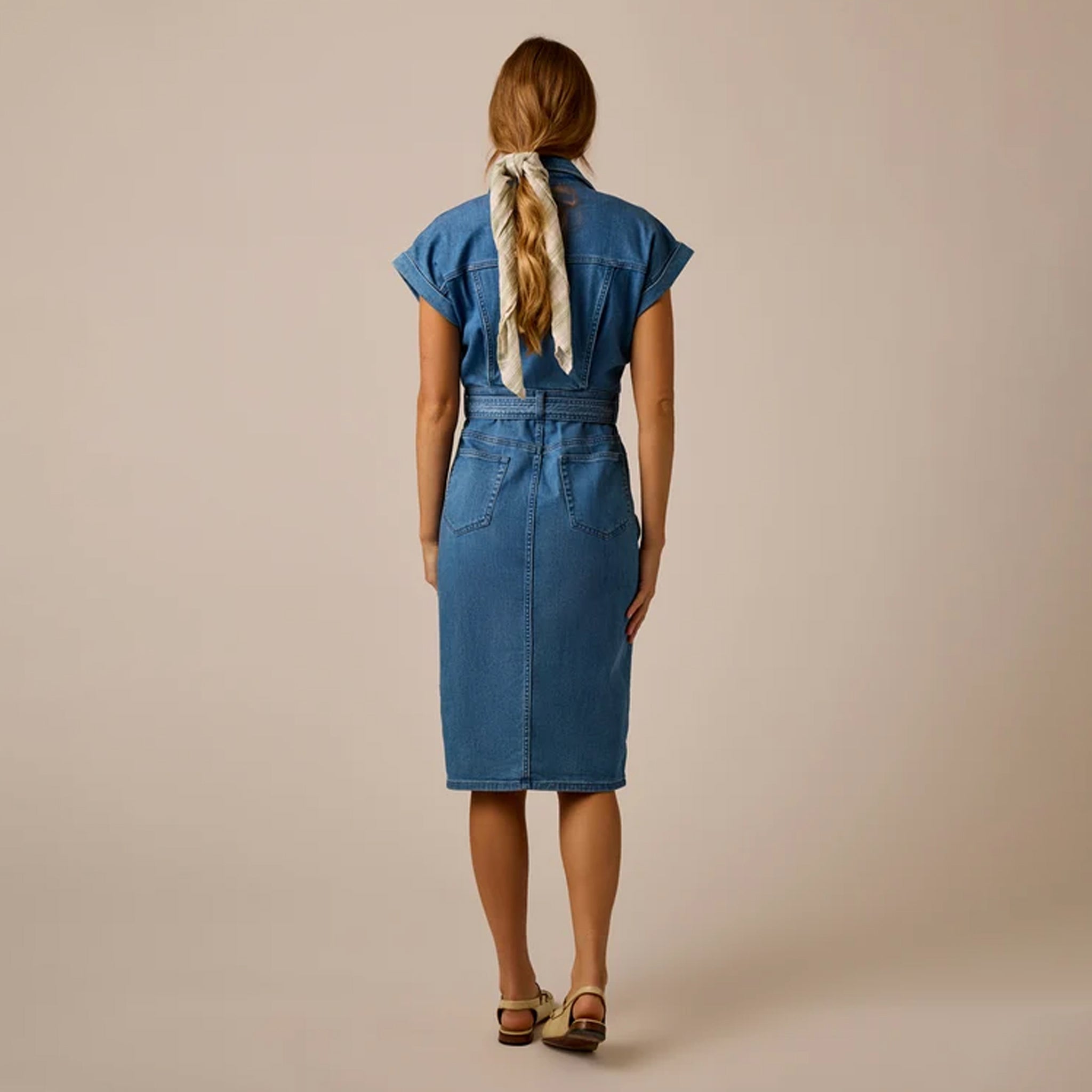 Carve Franny Lightweight Denim Dress in Magnolia shown on model on plain background.