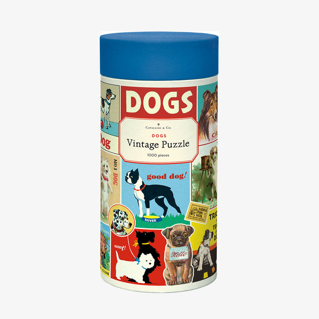 Cavallini Paper Dogs Puzzle in a tube with illustrations and photographs of dogs on a white background
