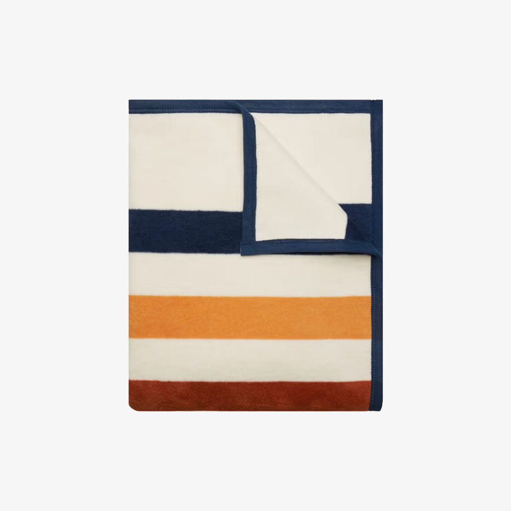 Chappy Wrap Casco Bay stripe  red blue and yellow blanket on a white background