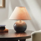 Charlie Mini Lamp in Blue on a table at Addison West