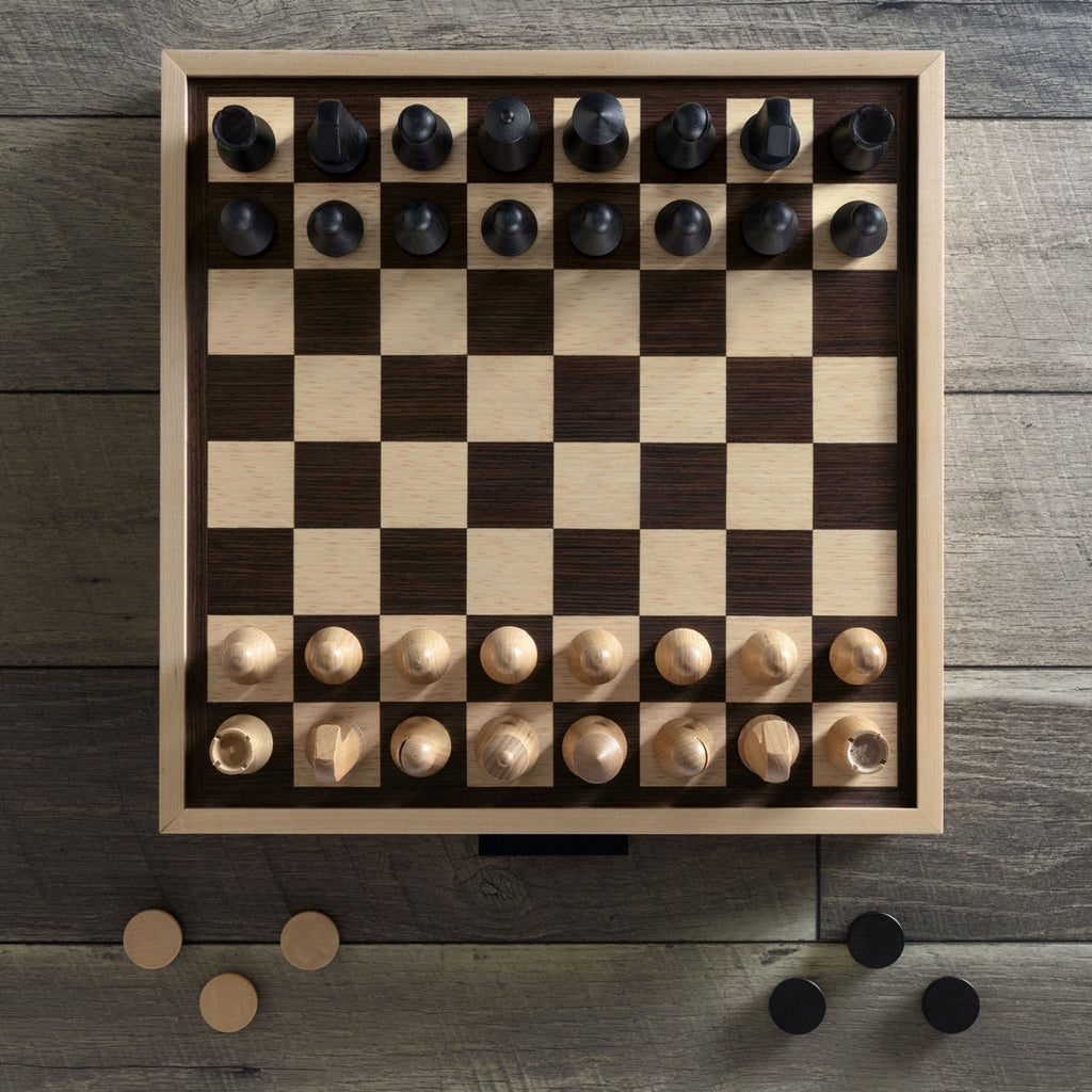 Wood chess set on a wood table 