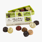 Box of Chocolates of Vermont with assorted chocolates on a white background