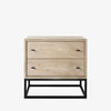 Cabinet with two drawers in white washed wood and black metal base on a white background