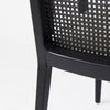 Clara Black Wood W/ Cream Fabric Seat and Cane Back Dining Chair on a white background