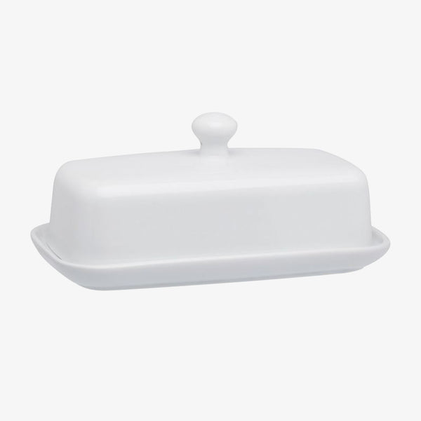 White butter dish with small white knob on top on a white backgroundWhite Porcelain Butter Dish with Knob Handle on a white background