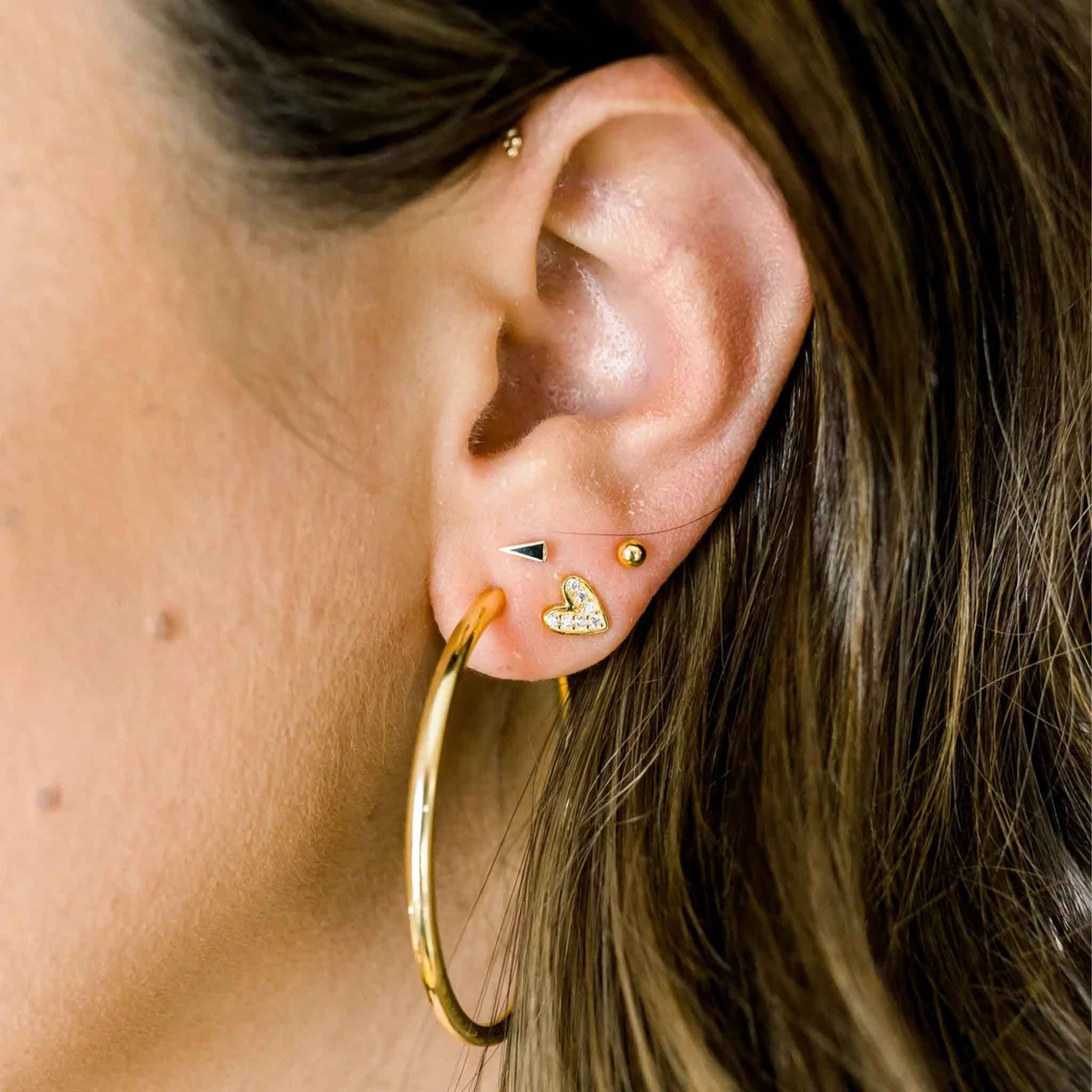 Elli Parr Classic Gold Hoops on a model at Addison West