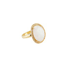 Elli Parr Cosmo Gold Pave Ring in Rainbow Moonstone on a white background at Addison West