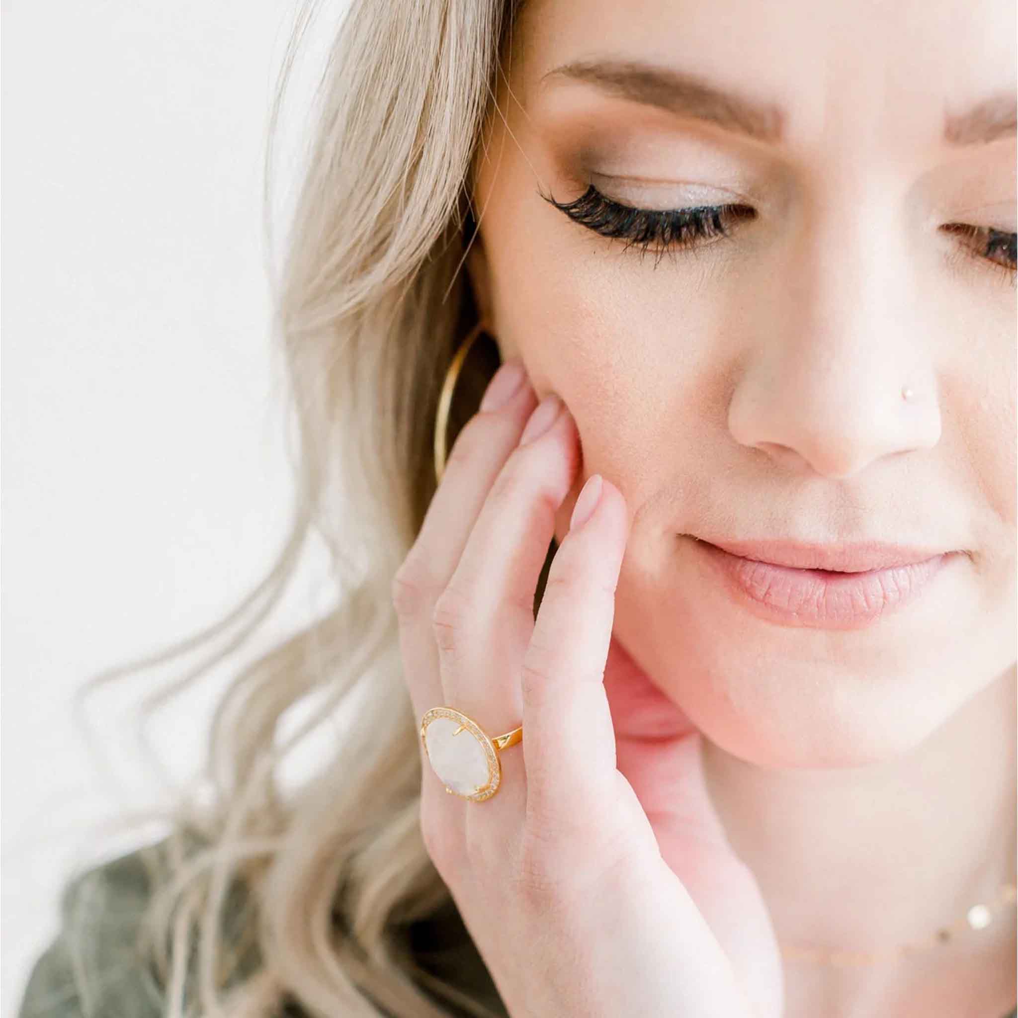Elli Parr Cosmo Gold Pave Ring in Rainbow Moonstone on a model at Addison West