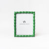 Green picture frame with bamboo wood style edge on a white background