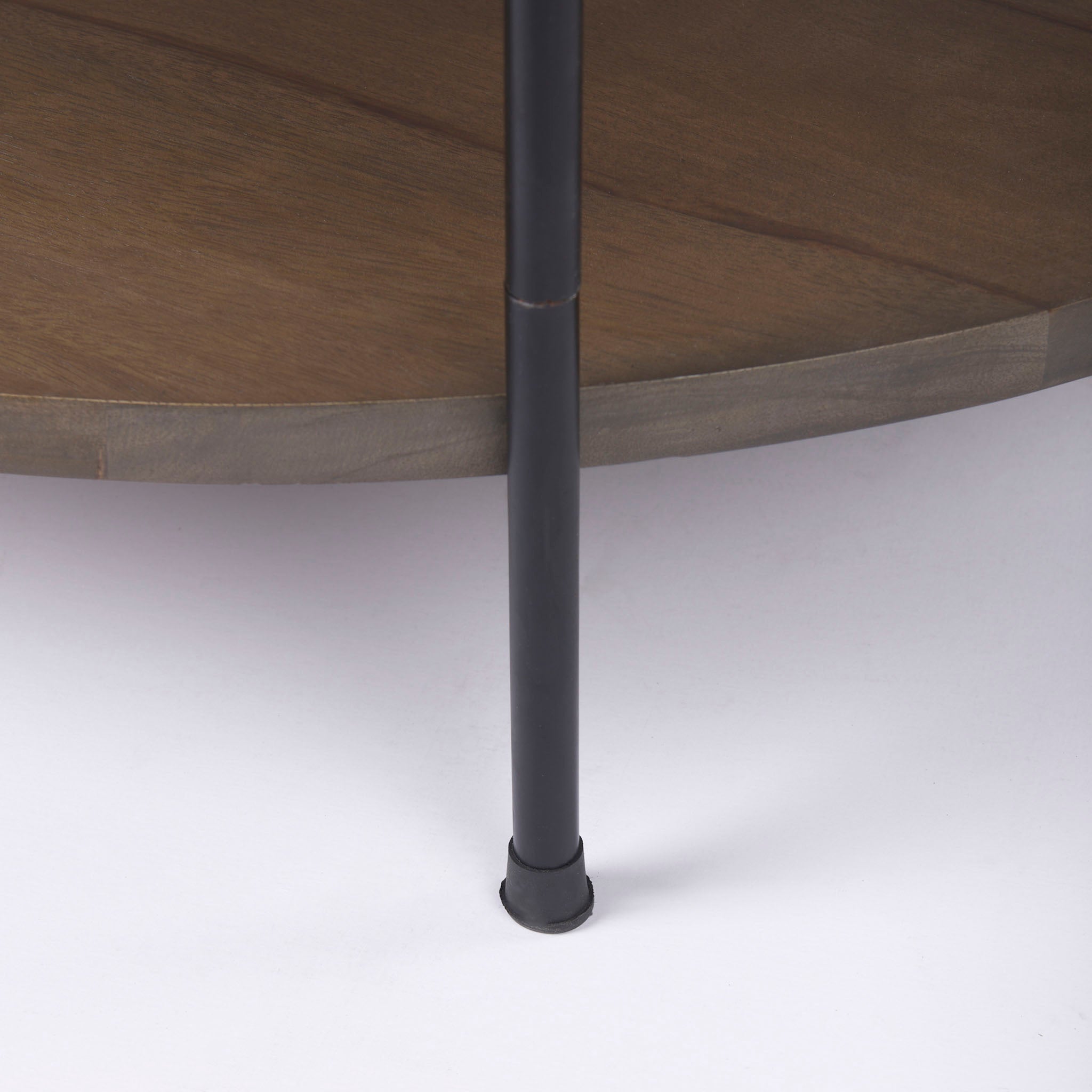 Round Marble Top Coffee Table with Dark Brown shelf and black iron frame on a white background