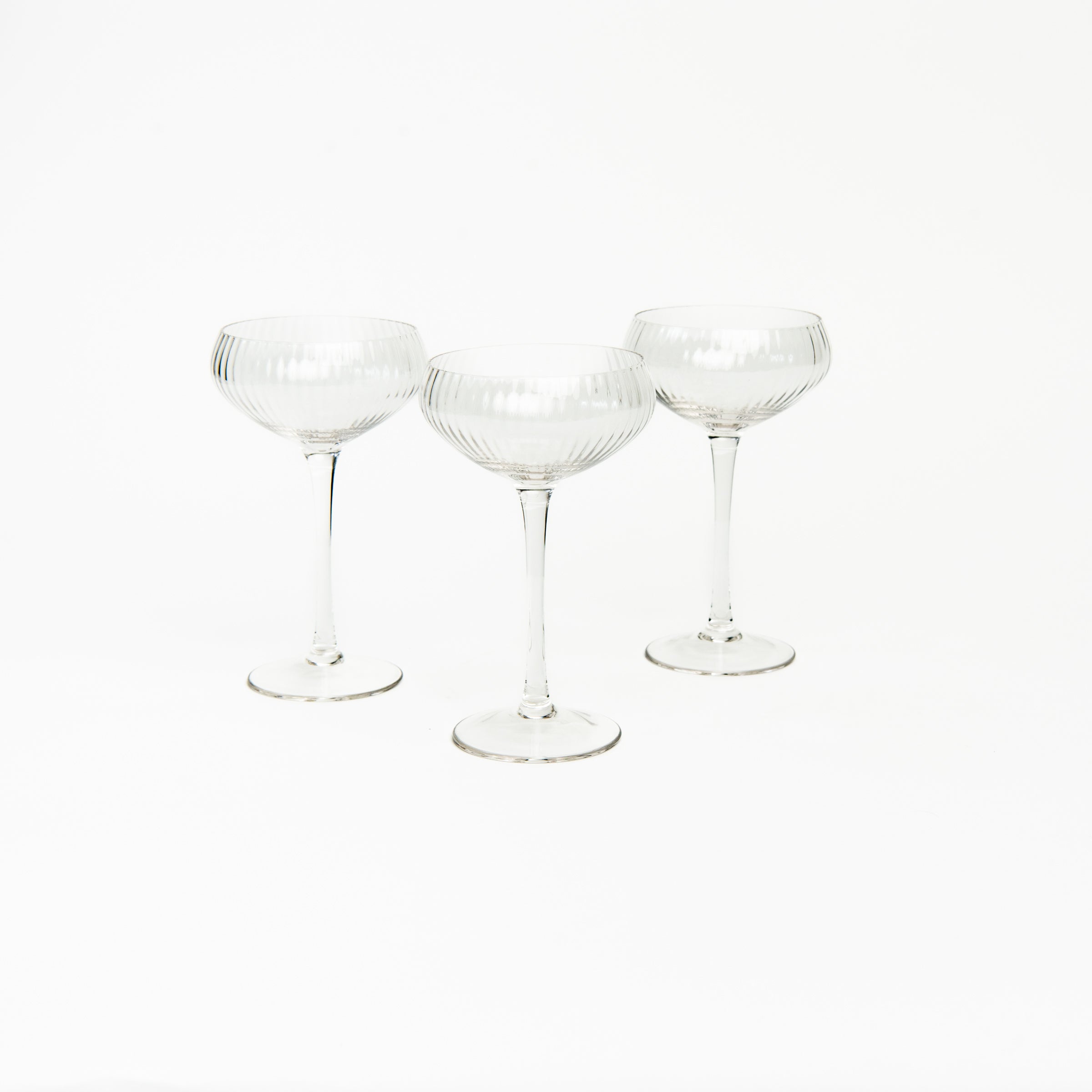 Fluted Champagne Coupe on a white background at Addison West
