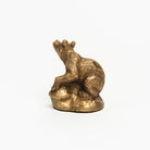 Antiqued Brass Bear on a white background at Addison West