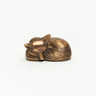 Antiqued Brass Sleeping Fox on a white background at Addison West
