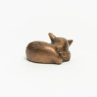 Antiqued Brass Sleeping Fox on a white background at Addison West