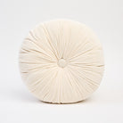 Velvet Tuft Round Cushion in Ivory on a white background at Addison West
