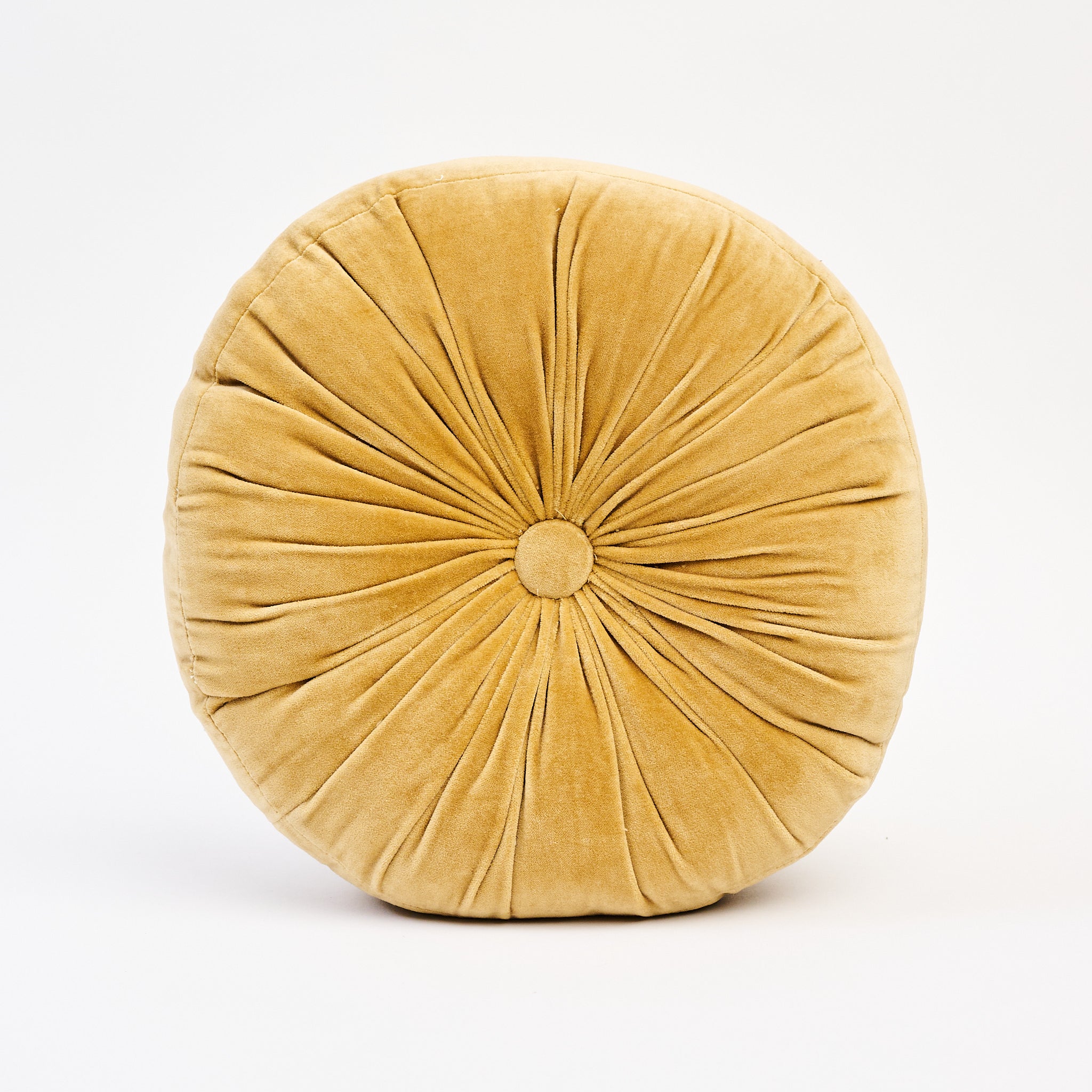 Velvet Tuft Round Cushion in Gold on a white background at Addison West