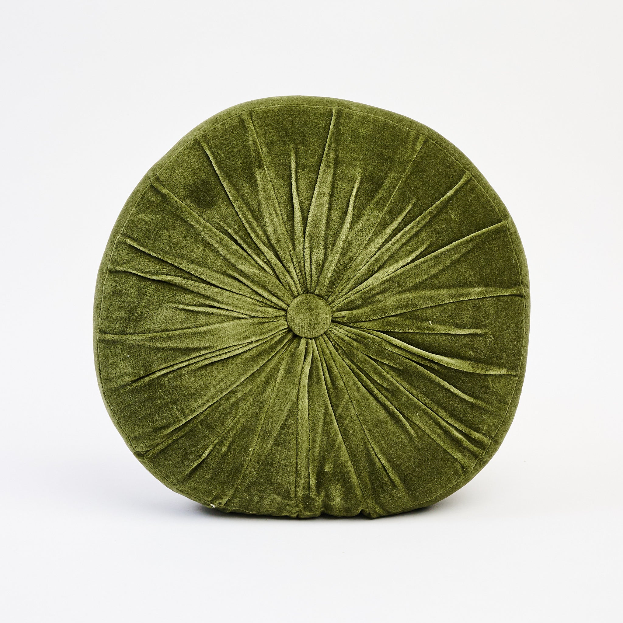 Velvet Tuft Round Cushion in Moss on a white background at Addison West
