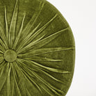 Velvet Tuft Round Cushion in Moss on a white background at Addison West