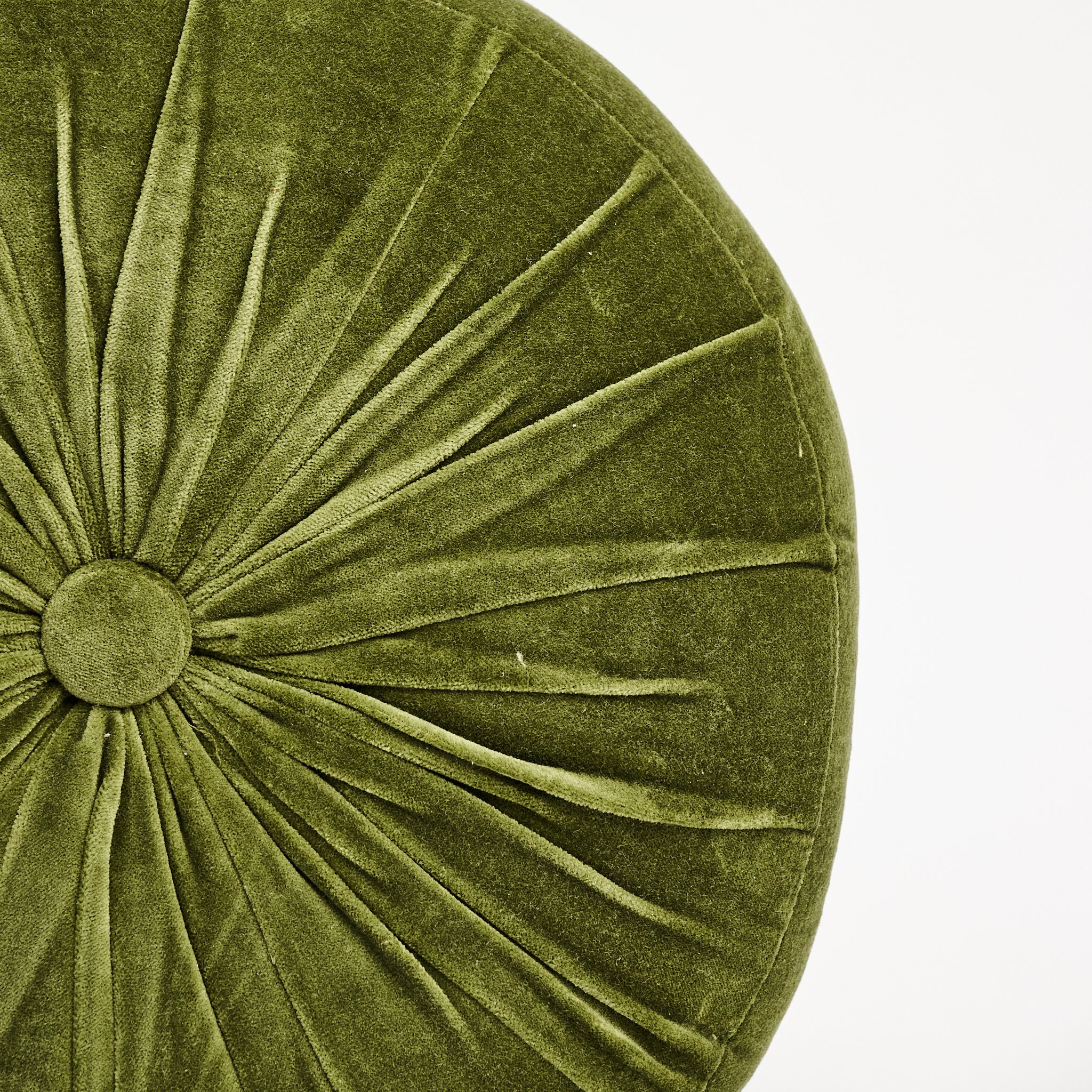 Velvet Tuft Round Cushion in Moss on a white background at Addison West