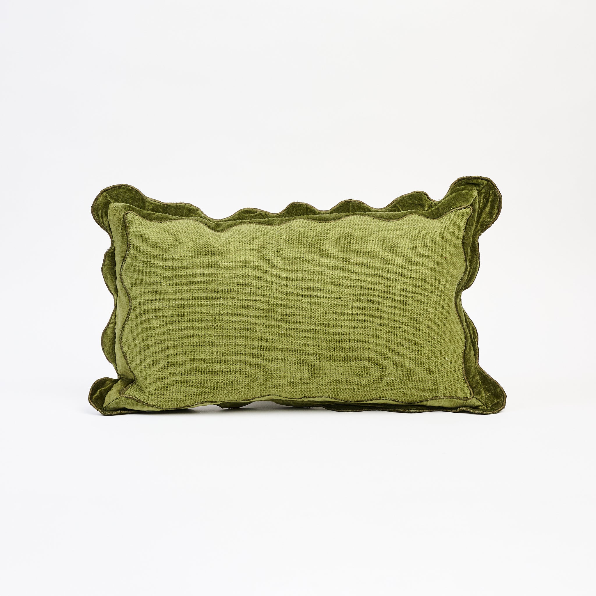 Velvet Scallop Lumbar Pillow in Moss on a white background at Addison West