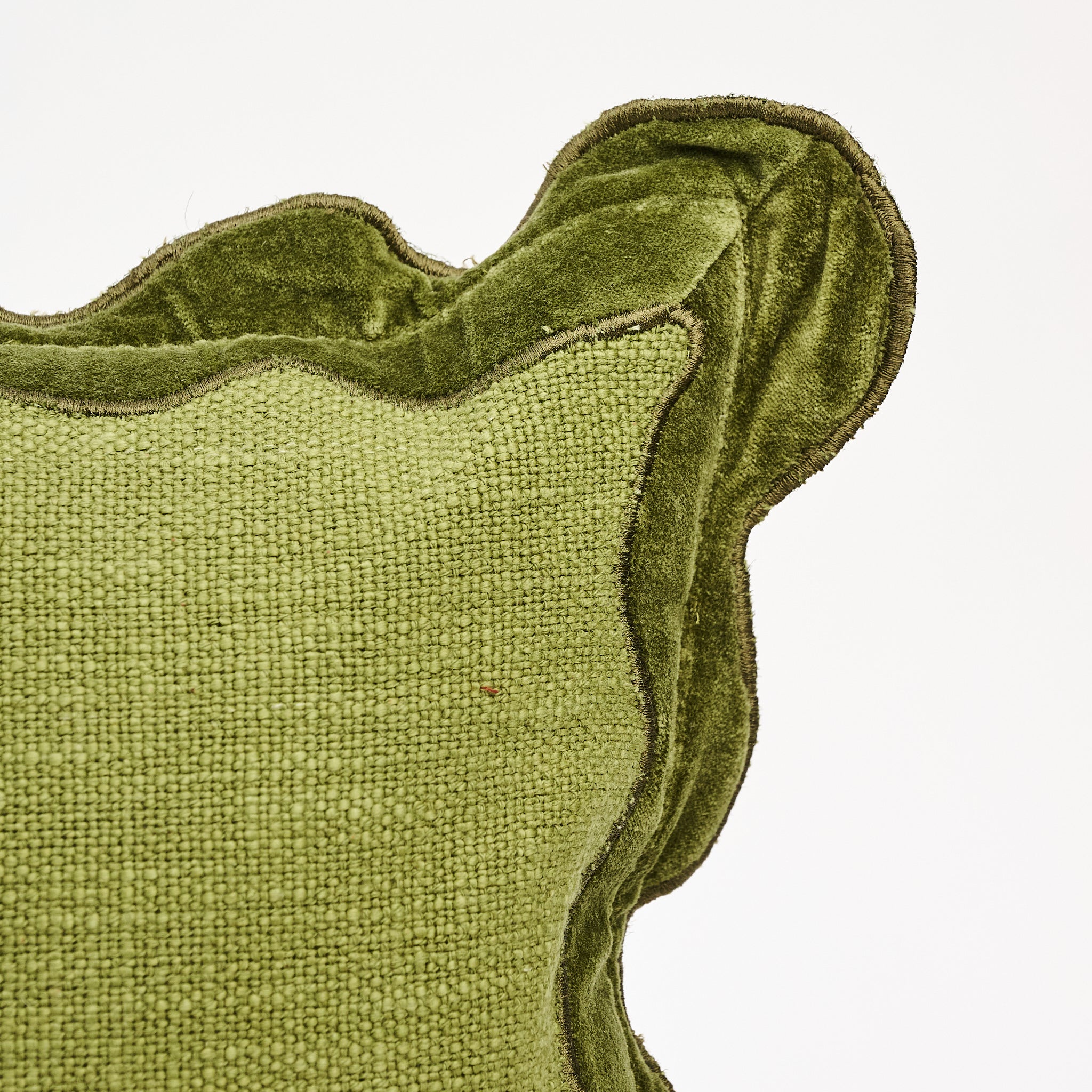 Velvet Scallop Lumbar Pillow in Moss on a white background at Addison West
