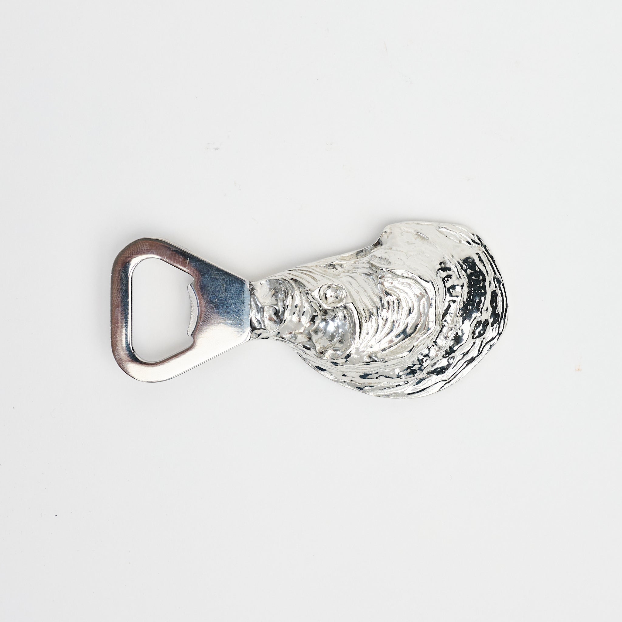 Oyster Shell Bottle Opener on a white background at Addison West