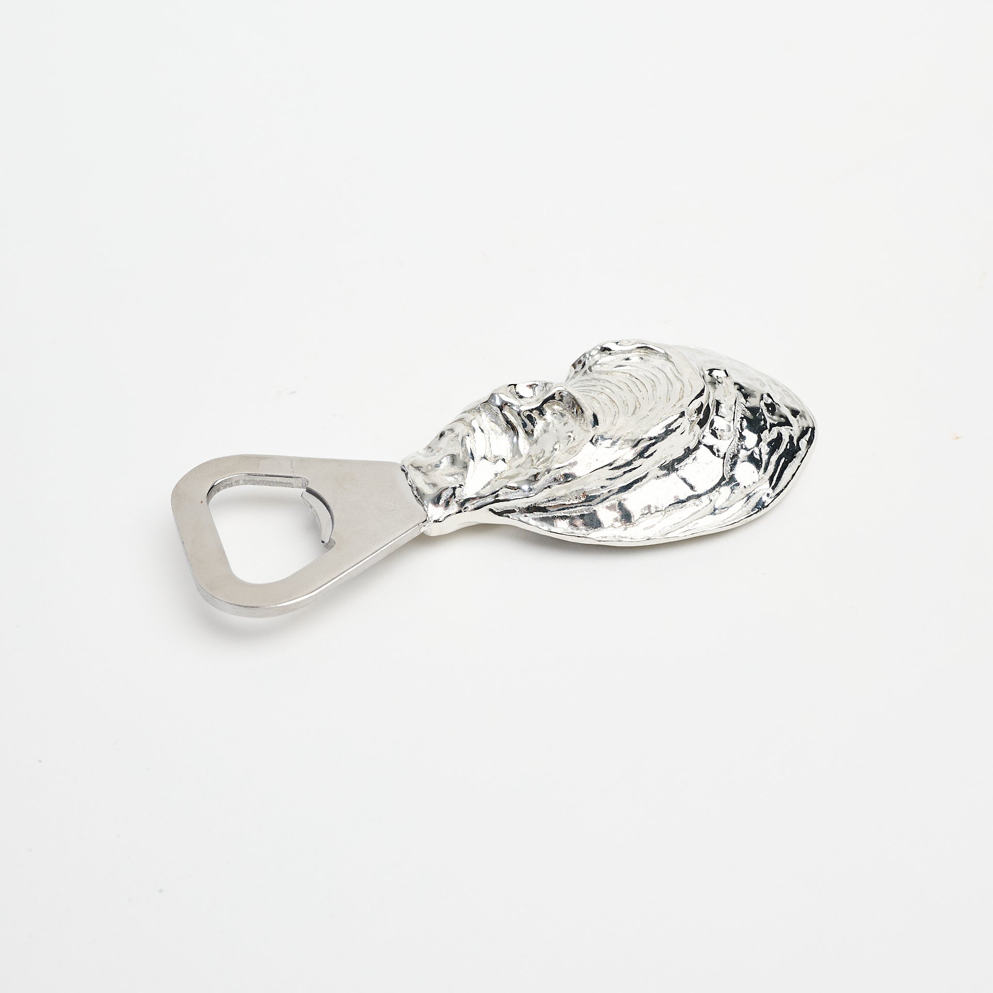 Oyster Shell Bottle Opener on a white background at Addison West