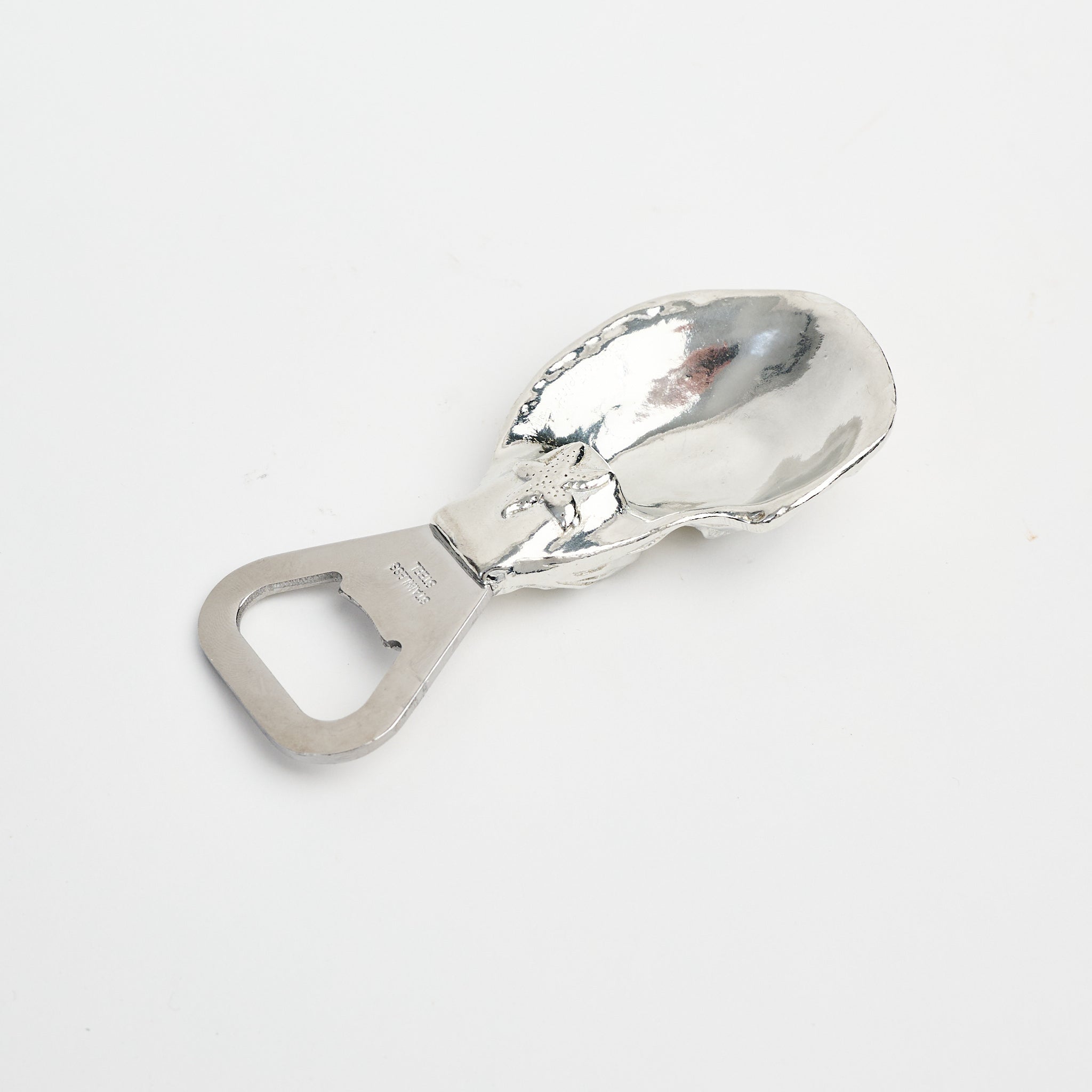 Oyster Shell Bottle Opener on a white background at Addison West