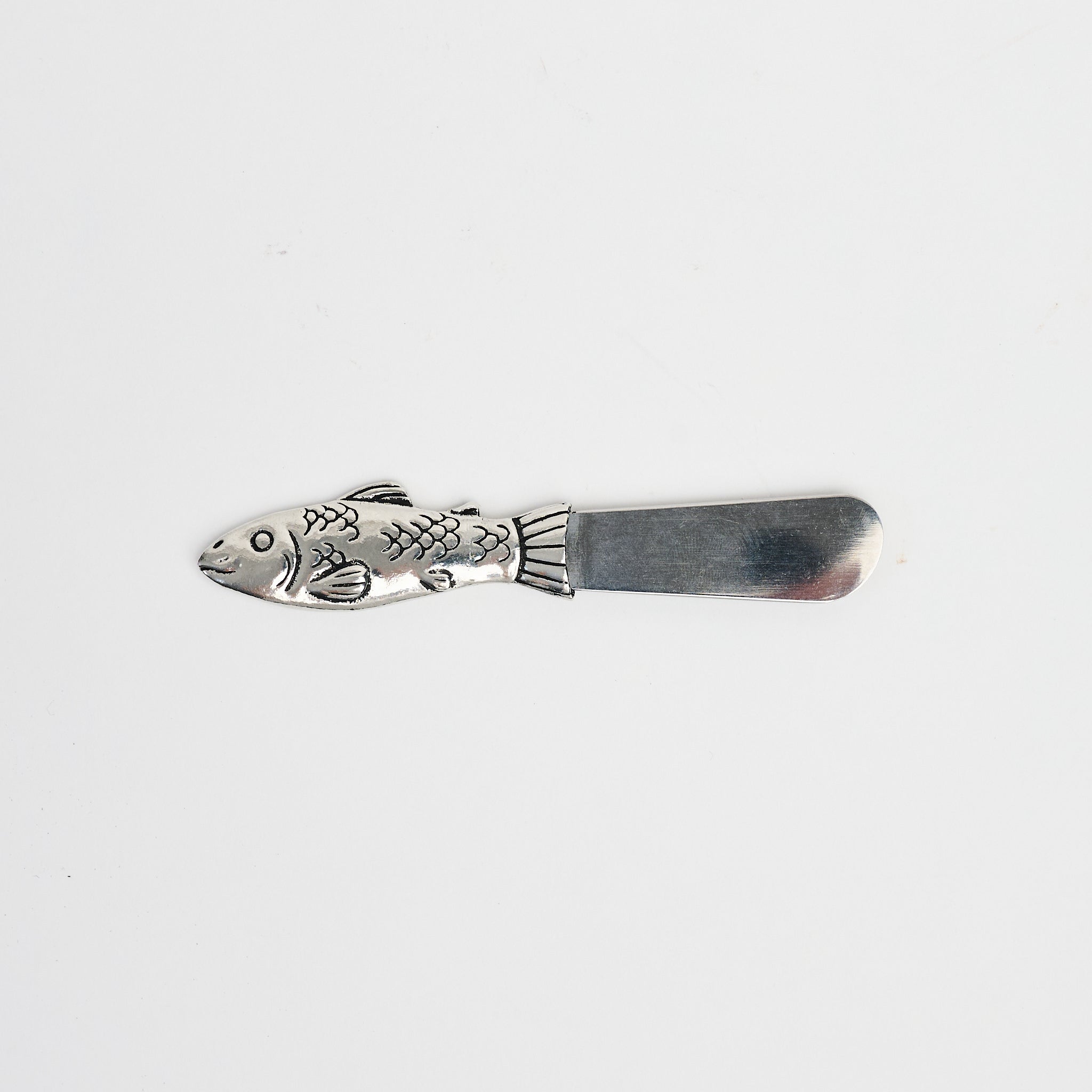Small Salmon Pate Knife on a white background at Addison West