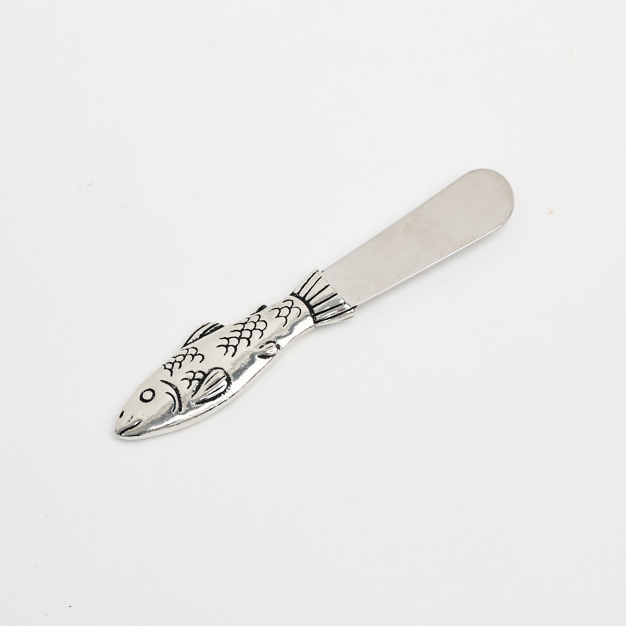 Small Salmon Pate Knife on a white background at Addison West