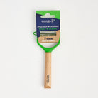 Opinel T-DUO Peeler Wood Handle in Green on a white background at Addison West