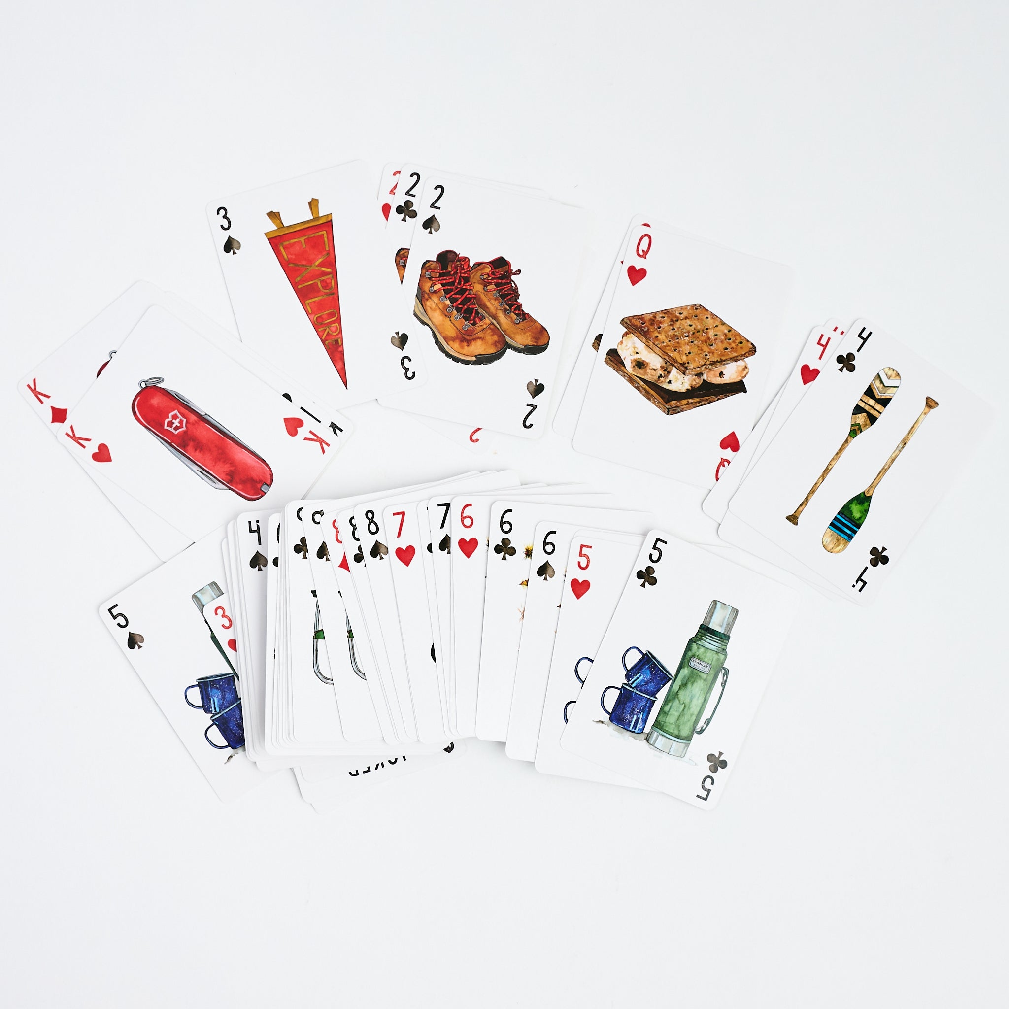 Camping Playing Cards on a white background at Addison West
