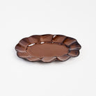 Stoneware Scalloped Oval Plate on a white background at Addison West