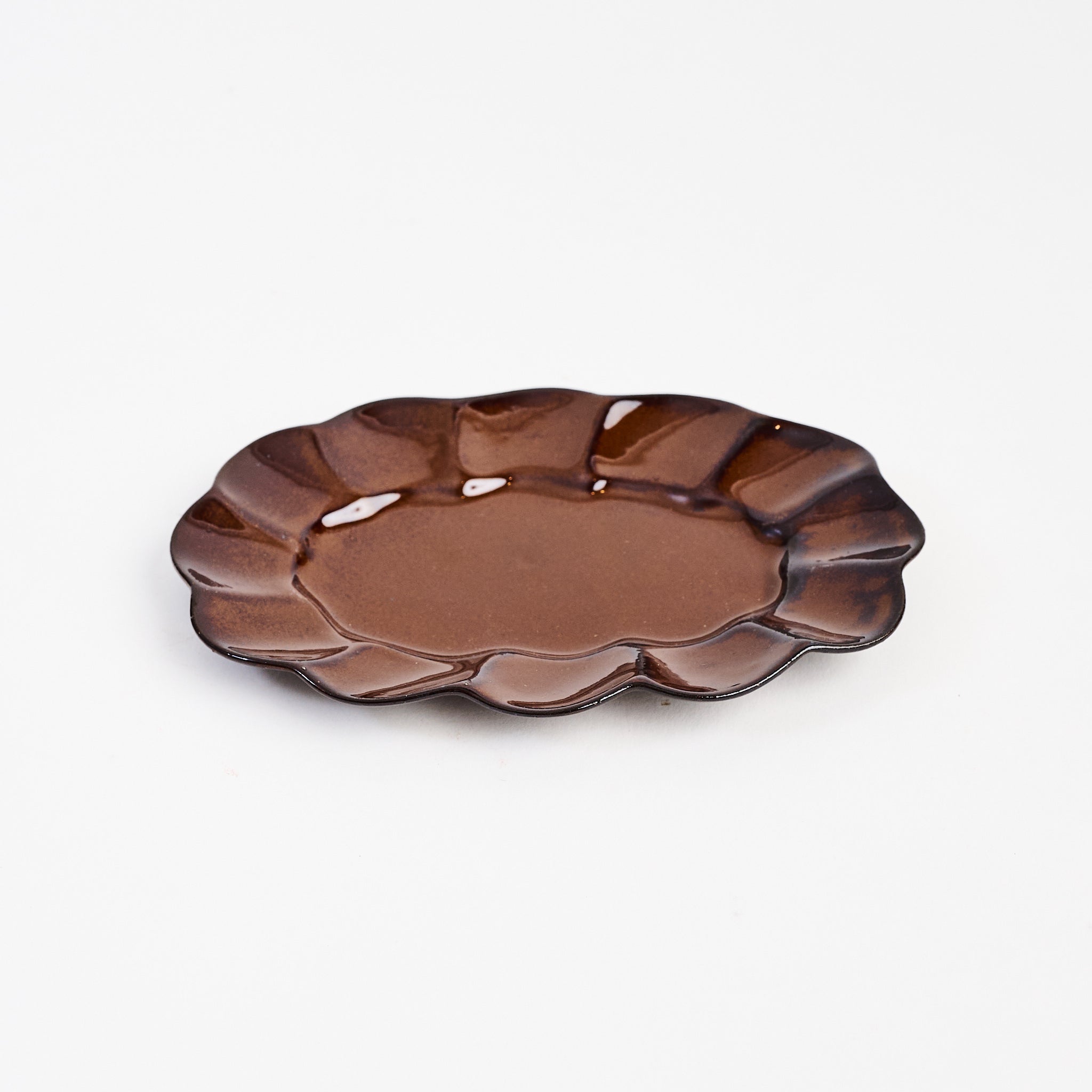 Stoneware Scalloped Oval Plate on a white background at Addison West