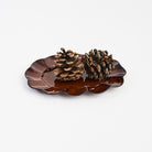 Stoneware Scalloped Oval Plate on a white background at Addison West
