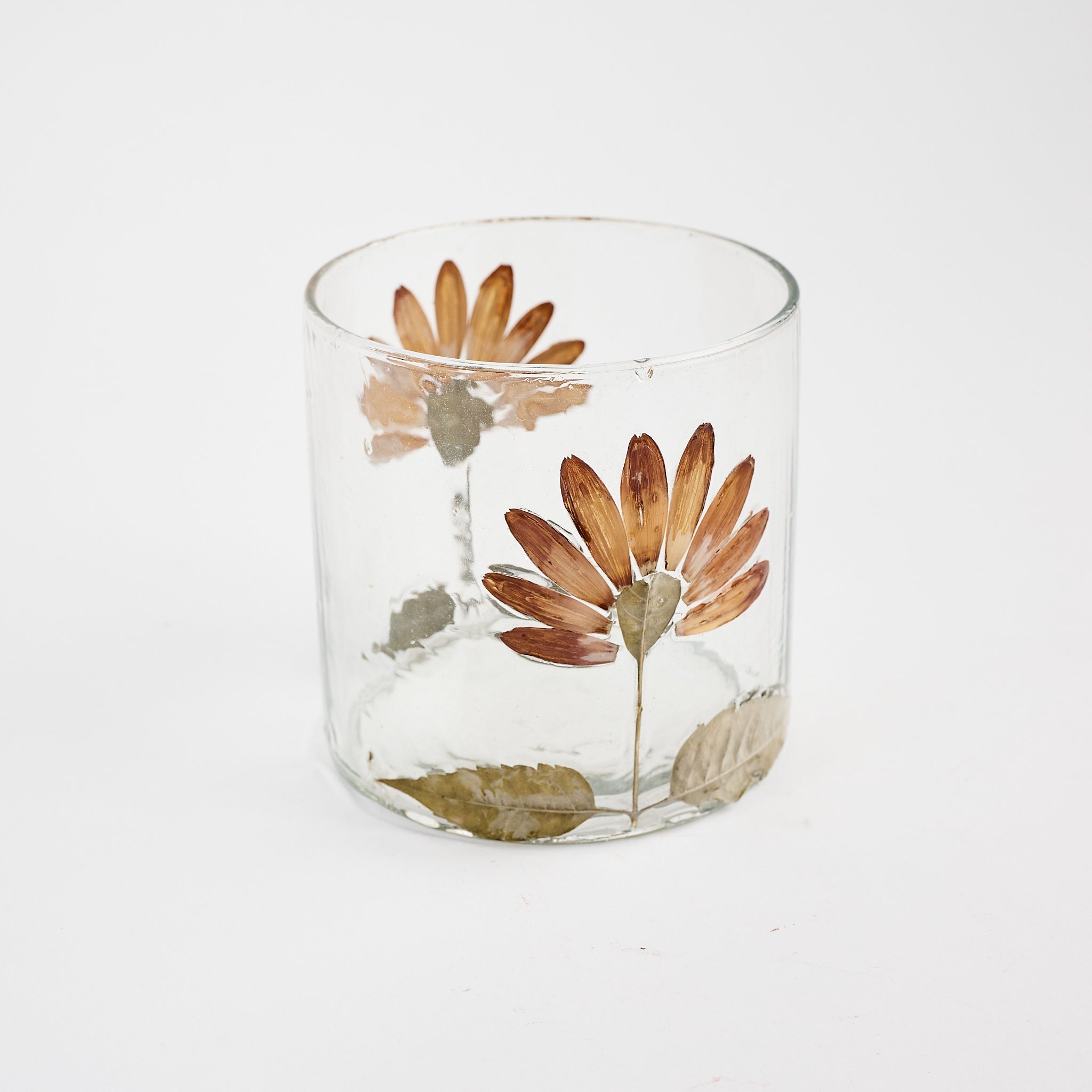 Gerber Daisy Votive on a white background at Addison West
