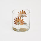 Gerber Daisy Votive on a white background at Addison West