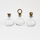 Carafes with shaped Stoppers on a white background at Addison West