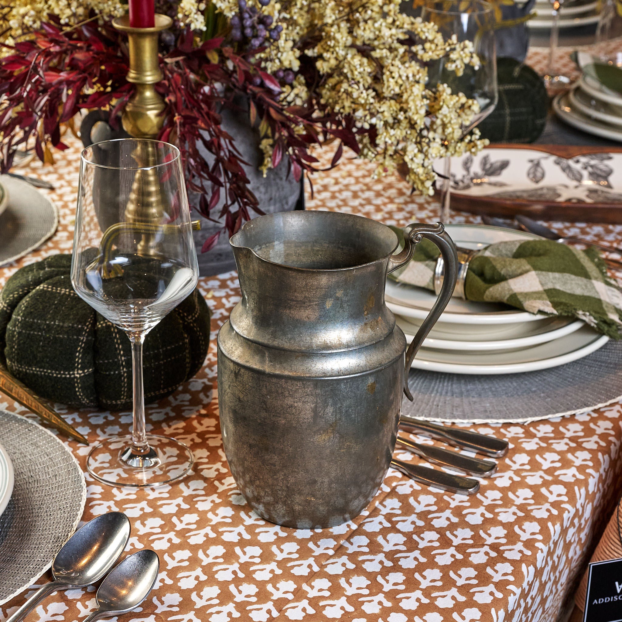 Vintage Pewter Pitcher on a table at Addison West
