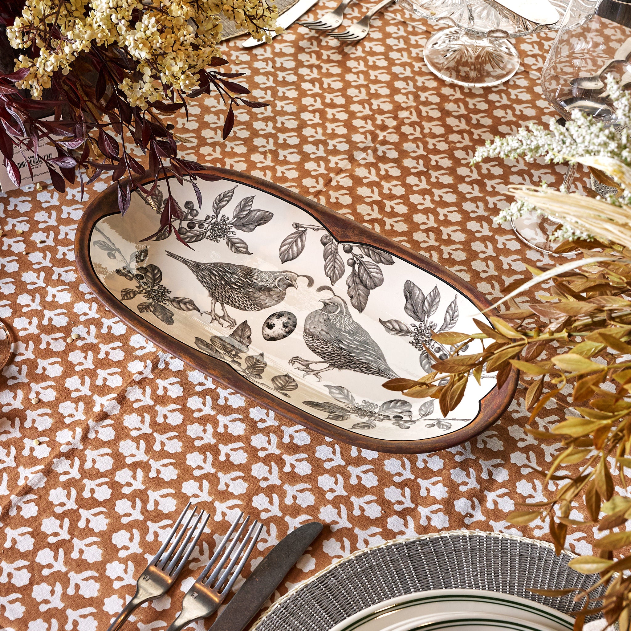 Laura Zindel Quail Rectangular Platter on a table at Addison West