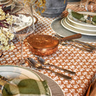 Vintage Copper Silent Butler on a table at Addison West