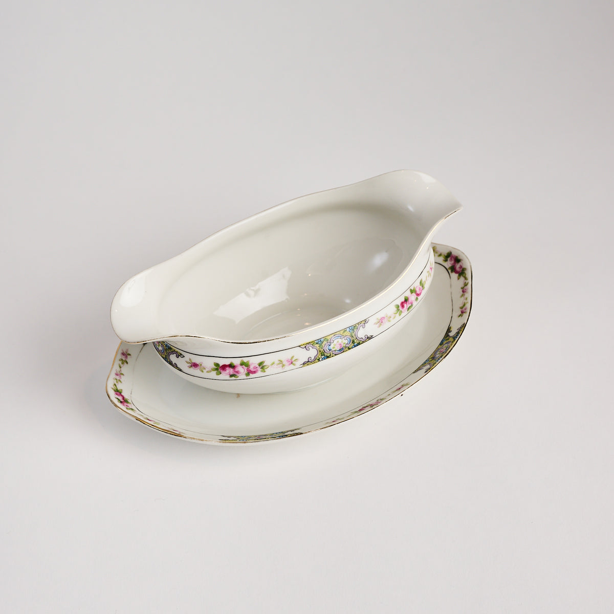 Vintage Gravy Boat on a white background at Addison West