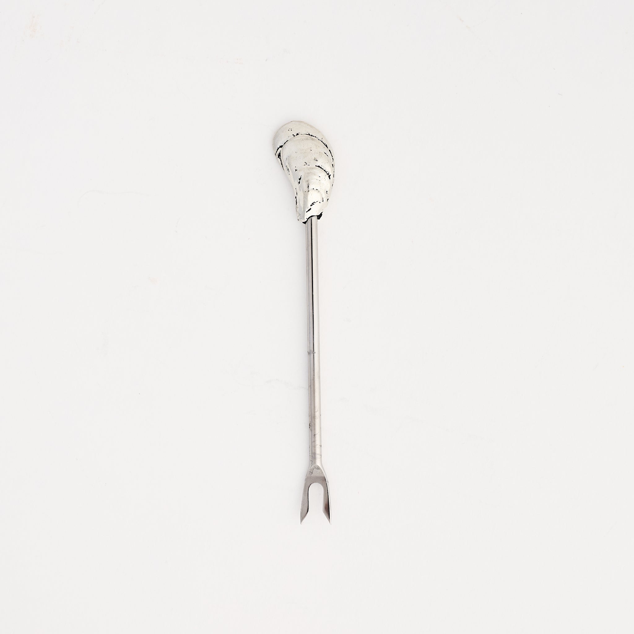 Oyster Shell Hors d'Oeuvres Pick on a white background at Addison West