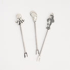 Pewter Fish, oyster, and octopus Hors d'Oeuvre Pick on a white background at Addison West