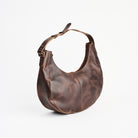 Stella Shoulder Bag in Dark Brown on a white background at Addison West
