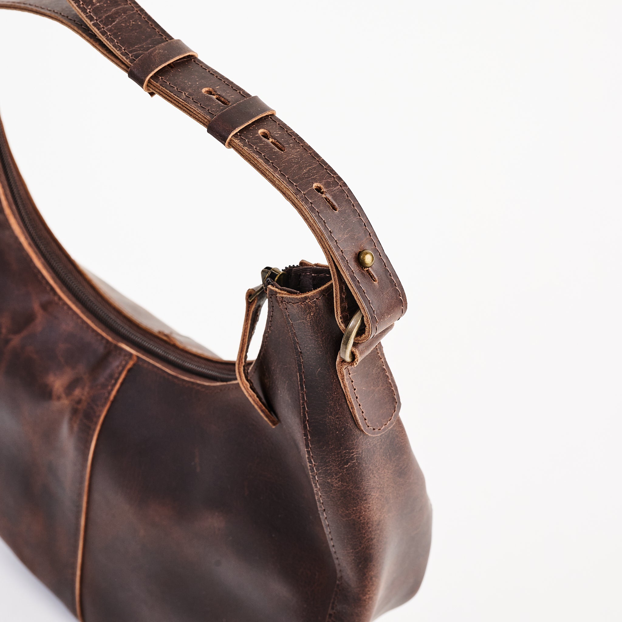 Stella Shoulder Bag in Dark Brown on a white background at Addison West